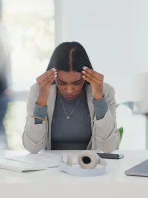 woman needing a mental health support in workplaces.